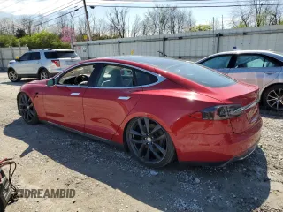 2014 Tesla Model S 60 with VIN 5YJSA1S12EFP65799, listed as a Copart auction lot 50895235 with 132,669 mi miles and Salvage Title. Bid and sale history available at DreamBid. Image 2.