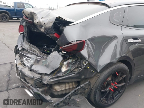 2016 Kia Optima SX Turbo with VIN 5XXGW4L2XGG012408, listed as a IAAI auction lot 42465787 with 67,564 mi miles and . Bid and sale history available at DreamBid. Image 12.