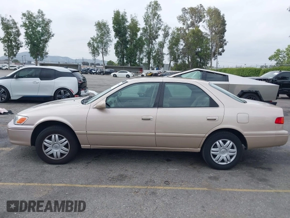 2001 Toyota Camry CE with VIN 4T1BG22K81U075758, listed as a IAAI auction lot 42024950 with 107,439 mi miles. Bid and sale history available at carsss.com. Image 14.