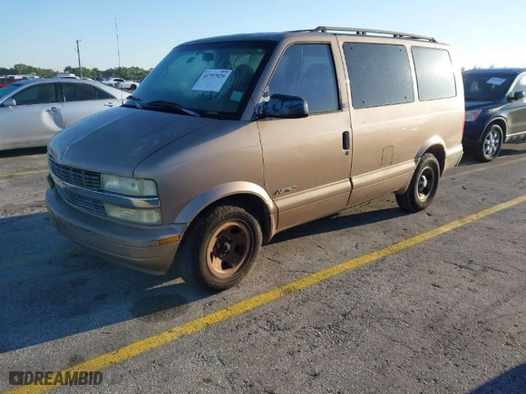 2001 Chevrolet Astro Passenger with VIN 1GNDM19W81B153063, listed as a IAAI auction lot 41757929 with 144,340 mi miles. Bid and sale history available at carsss.com. Image 2.