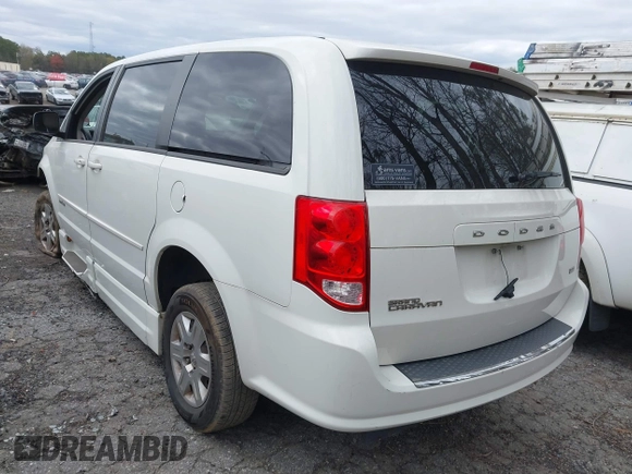 2012 Dodge Grand Caravan SE with VIN 2C4RDGBG9CR232038, listed as a IAAI auction lot 41823766 with 77,468 mi miles and . Bid and sale history available at DreamBid. Image 3.