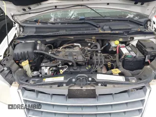 2009 Chrysler Town & Country LX with VIN 2A8HR44E39R606779, listed as a IAAI auction lot 42059256 with 177,228 mi miles and . Bid and sale history available at DreamBid. Image 10.