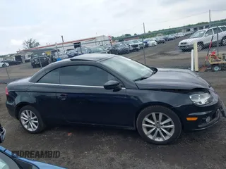 2014 Volkswagen Eos Sport with VIN WVWBW8AH2EV003356, listed as a IAAI auction lot 42394312 with 70,448 mi miles and . Bid and sale history available at DreamBid. Image 14.