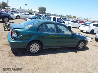 1999 Honda Civic VP with VIN 2HGEJ6611XH540017, listed as a IAAI auction lot 42093222 with 154,261 mi miles. Bid and sale history available at carsss.com. Image 13.