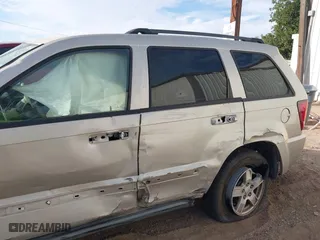 2007 Jeep Grand Cherokee Laredo with VIN 1J8GS48K77C515424, listed as a IAAI auction lot 41072236 with 263,248 mi miles. Bid and sale history available at carsss.com. Image 12.