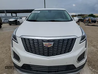 2022 Cadillac XT5 FWD Premium Luxury z VIN 1GYKNCRS0NZ175748, wystawiony jako Copart lot #61651885 z przebiegiem 13 747 mil mil oraz Szkoda całkowita • Salvage title. Historia ofert i sprzedaży dostępna na DreamBid. Obrazek 5.