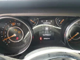 2020 Jeep Wrangler Unlimited Sport S z VIN 1C4HJXDN5LW155501, wystawiony jako Copart lot #63217835 z przebiegiem 80 662 mil mil oraz Czysty tytuł • Clean title. Historia ofert i sprzedaży dostępna na DreamBid. Obrazek 9.