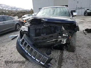 2015 Jeep Grand Cherokee Limited with VIN 1C4RJFBG6FC924659, listed as a Copart auction lot 51552015 with 99,912 mi miles and Salvage Title. Bid and sale history available at carsss.com. Image 11.