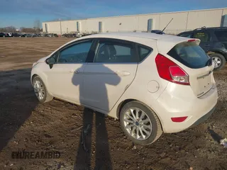 2017 Ford Fiesta Titanium with VIN 3FADP4FJ8HM112435, listed as a IAAI auction lot 41005143 with 75,144 mi miles and . Bid and sale history available at DreamBid. Image 3.