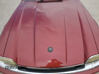 1995 Jaguar XJS with VIN SAJNX2742SC197388, listed as a Copart auction lot 76579714 with 99,077 mi miles and Salvage Title. Bid and sale history available at carsss.com. Image 11.