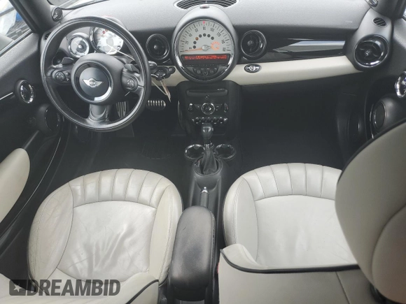 2012 MINI Convertible S with VIN WMWZP3C56CT250886, listed as a Copart auction lot 50027405 with 92,990 mi miles and Salvage title. Bid and sale history available at DreamBid. Image 8.