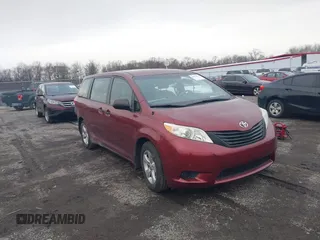 2014 Toyota Sienna L with VIN 5TDZK3DC8ES477402, listed as a IAAI auction lot 41494073 with 102,063 mi miles. Bid and sale history available at carsss.com. Image 1.