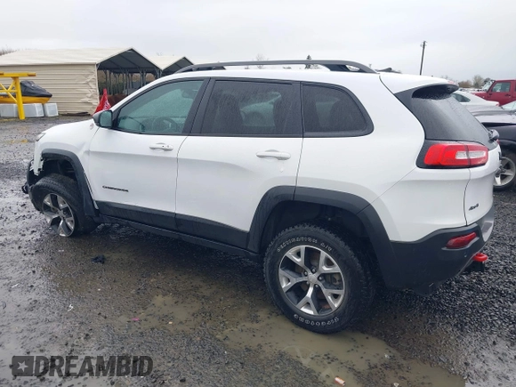 2018 Jeep Cherokee Trailhawk with VIN 1C4PJMBBXJD567022, listed as a IAAI auction lot 41834618 with 41,017 mi miles and . Bid and sale history available at DreamBid. Image 3.