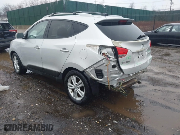 2011 Hyundai Tucson Limited with VIN KM8JUCAC9BU200367, listed as a IAAI auction lot 41867617 with 228,456 mi miles and . Bid and sale history available at DreamBid. Image 3.