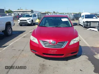 2007 Toyota Camry z VIN JTNBB46K673009891, wystawiony jako IAAI lot #42161828 z przebiegiem 220 292 mil mil oraz . Historia ofert i sprzedaży dostępna na DreamBid. Obrazek 13.