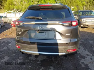 2018 Mazda CX-9 Grand Touring with VIN JM3TCBDY3J0231936, listed as a IAAI auction lot 42159391 with 105,125 mi miles and . Bid and sale history available at DreamBid. Image 17.