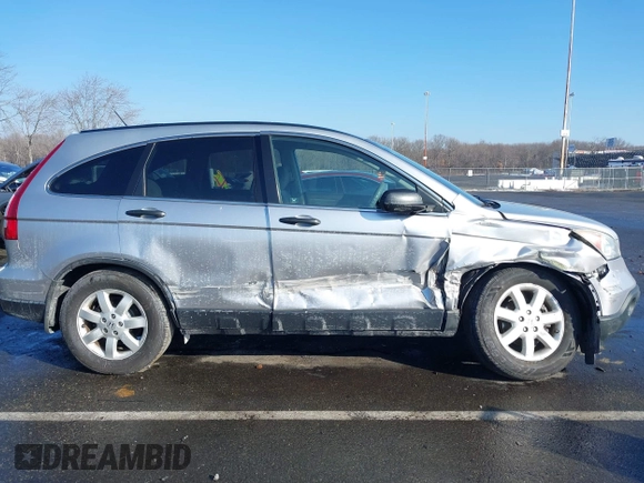 2009 Honda CR-V EX with VIN 3CZRE38589G704086, listed as a IAAI auction lot 41348951 with 128,784 mi miles and . Bid and sale history available at carsss.com. Image 13.
