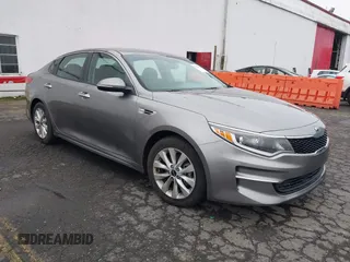 2018 Kia Optima LX with VIN 5XXGT4L3XJG253653, listed as a IAAI auction lot 41316235 with 84,261 mi miles. Bid and sale history available at carsss.com. Image 1.