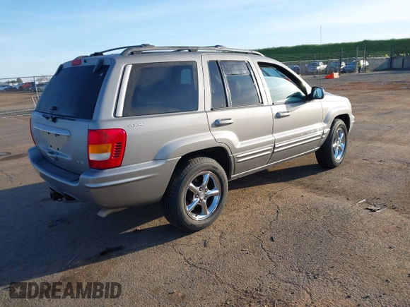2001 Jeep Grand Cherokee Limited with VIN 1J4GW58N61C670589, listed as a IAAI auction lot 41817712 with 185,905 mi miles. Bid and sale history available at carsss.com. Image 4.