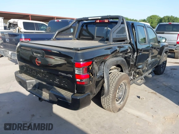 2022 Nissan Frontier S with VIN 1N6ED1EK2NN677116, listed as a IAAI auction lot 42017620 with 14,653 mi miles. Bid and sale history available at carsss.com. Image 4.