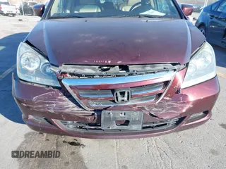 2007 Honda Odyssey EX-L with VIN 5FNRL38697B460066, listed as a IAAI auction lot 41453305 with 169,008 mi miles. Bid and sale history available at carsss.com. Image 6.