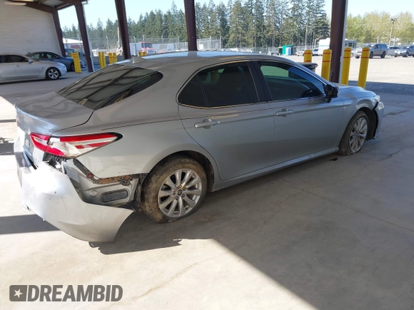2020 Toyota Camry LE with VIN 4T1C11AKXLU381686, listed as a IAAI auction lot 42013767 with 32,603 mi miles. Bid and sale history available at carsss.com. Image 4.