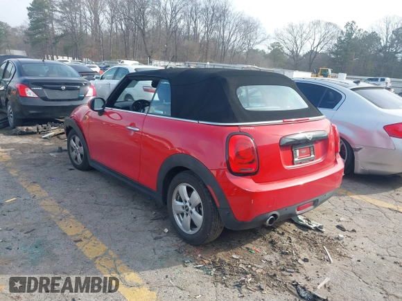 2019 MINI Convertible Cooper with VIN WMWWG5C59K3F79792, listed as a IAAI auction lot 41779813 with 25,671 mi miles and . Bid and sale history available at DreamBid. Image 3.