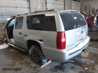 2010 Chevrolet Suburban LS with VIN 1GNUKHE30AR158386, listed as a IAAI auction lot 41569782 with 1 mi miles. Bid and sale history available at carsss.com. Image 3.