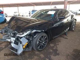 2023 Toyota GR86 with VIN JF1ZNBC1XP8751486, listed as a IAAI auction lot 41692791 with 12,460 mi miles. Bid and sale history available at carsss.com. Image 17.
