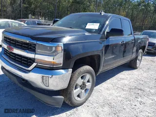 2016 Chevrolet Silverado 1500 LT with VIN 1GCVKREH0GZ201972, listed as a IAAI auction lot 41856573 with 214,086 mi miles. Bid and sale history available at carsss.com. Image 17.