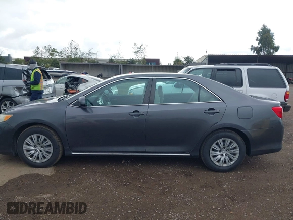 2014 Toyota Camry L with VIN 4T1BF1FK5EU403313, listed as a IAAI auction lot 42141338 with 185,925 mi miles and . Bid and sale history available at DreamBid. Image 14.