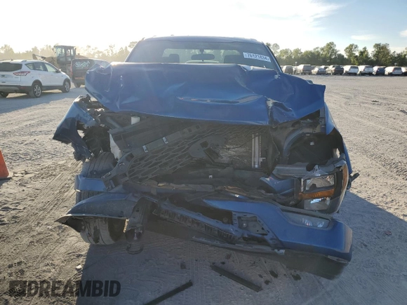 2023 Ford F-150 XL with VIN 1FTFW1E51PKF30933, listed as a Copart auction lot 76121834 with 26,267 mi miles and Salvage Title. Bid and sale history available at carsss.com. Image 5.
