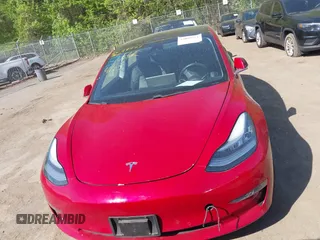 2018 Tesla Model 3 Long Range Battery z VIN 5YJ3E1EA3JF047287, wystawiony jako IAAI lot #42099771 z przebiegiem 120 470 mil mil oraz . Historia ofert i sprzedaży dostępna na DreamBid. Obrazek 11.