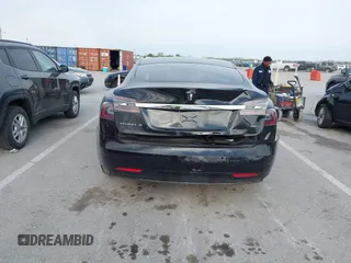 2017 Tesla Model S 100D with VIN 5YJSA1E28HF188981, listed as a IAAI auction lot 42010115 with 76,327 mi miles and . Bid and sale history available at DreamBid. Image 16.