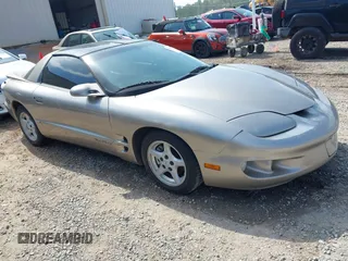 2002 Pontiac Firebird Firebird z VIN 2G2FS22K722105297, wystawiony jako IAAI lot #42350571 z przebiegiem 249 177 mil mil oraz . Historia ofert i sprzedaży dostępna na DreamBid. Obrazek 1.