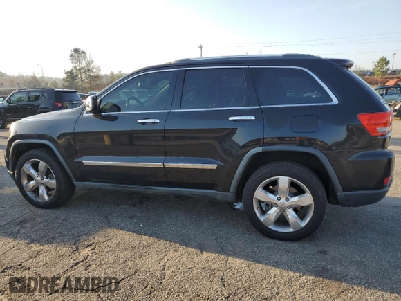 2011 Jeep Grand Cherokee Overland with VIN 1J4RS6GT5BC648076, listed as a Copart auction lot 48878135 with 223,263 mi miles and Salvage Title. Bid and sale history available at DreamBid. Image 2.