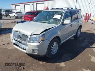 2009 Mercury Mariner Premier z VIN 4M2CU87G69KJ11232, wystawiony jako IAAI lot #41761605 z przebiegiem 63 239 mil mil oraz . Historia ofert i sprzedaży dostępna na DreamBid. Obrazek 2.