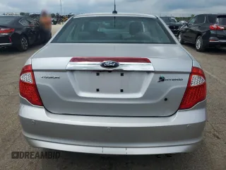 2010 Ford Fusion Hybrid with VIN 3FADP0L33AR140229, listed as a Copart auction lot 63084475 with 164,313 mi miles and Salvage title. Bid and sale history available at DreamBid. Image 6.