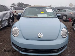 2015 Volkswagen Beetle 1.8T w/Tech with VIN 3VW517AT9FM802294, listed as a IAAI auction lot 41516005 with 110,184 mi miles and . Bid and sale history available at DreamBid. Image 12.