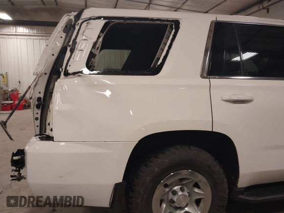 2015 Chevrolet Tahoe Commercial with VIN 1GNSK2EC5FR688820, listed as a IAAI auction lot 41444813 with 206,244 mi miles and . Bid and sale history available at DreamBid. Image 18.