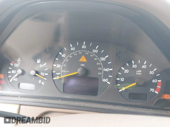 2001 Mercedes-Benz E-Class AWD with VIN WDBJH82J61X057506, listed as a IAAI auction lot 41506666 with 304,332 mi miles. Bid and sale history available at carsss.com. Image 7.