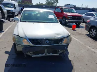 2001 Toyota Avalon XL z VIN 4T1BF28B51U139054, wystawiony jako IAAI lot #42223994 z przebiegiem 250 902 mil mil oraz . Historia ofert i sprzedaży dostępna na DreamBid. Obrazek 6.