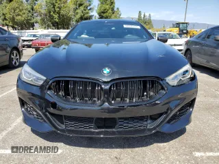 2022 BMW 8 Series M850i with VIN WBAGV8C02NCK08667, listed as a Copart auction lot 50335155 with 22,737 mi miles and Salvage title. Bid and sale history available at DreamBid. Image 5.