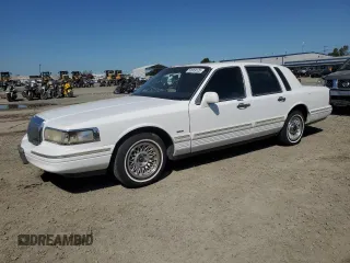 1995 Lincoln Town Car Executive with VIN 1LNLM81W0SY671753, listed as a Copart auction lot 50069125 with 173,524 mi miles and Salvage title. Bid and sale history available at DreamBid. Image 1.