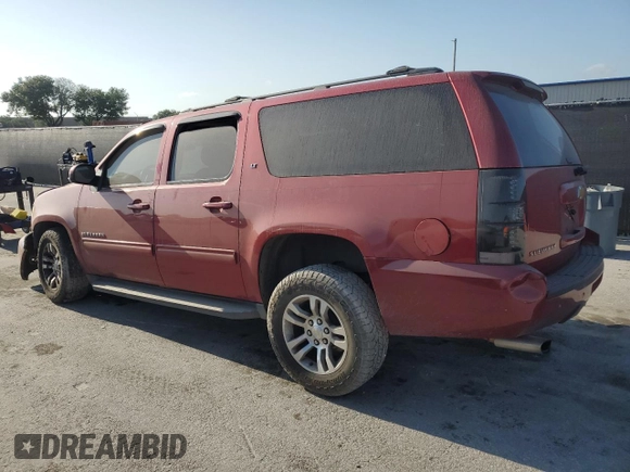 2013 Chevrolet Suburban LT with VIN 1GNSCJE08DR374024, listed as a Copart auction lot 54873375 with 141,206 mi miles and Salvage title. Bid and sale history available at DreamBid. Image 2.