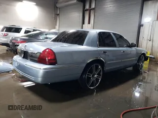 2010 Mercury Grand Marquis LS z VIN 2MEBM7FV1AX630474, wystawiony jako Copart lot #52318615 z przebiegiem Nie podano mil oraz Szkoda całkowita • Salvage title. Historia ofert i sprzedaży dostępna na DreamBid. Obrazek 3.