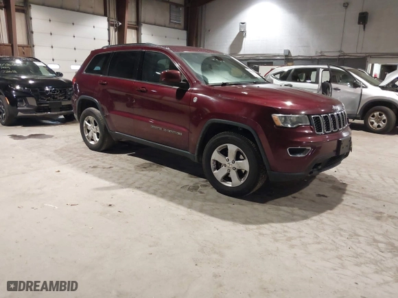 2018 Jeep Grand Cherokee Laredo E with VIN 1C4RJFAG9JC359284, listed as a IAAI auction lot 41032232 with 163,679 mi miles. Bid and sale history available at carsss.com. Image 1.