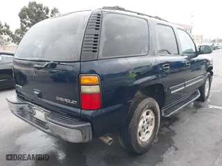 2004 Chevrolet Tahoe LS with VIN 1GNEC13T64J195165, listed as a IAAI auction lot 41446654 with 351,992 mi miles. Bid and sale history available at carsss.com. Image 4.