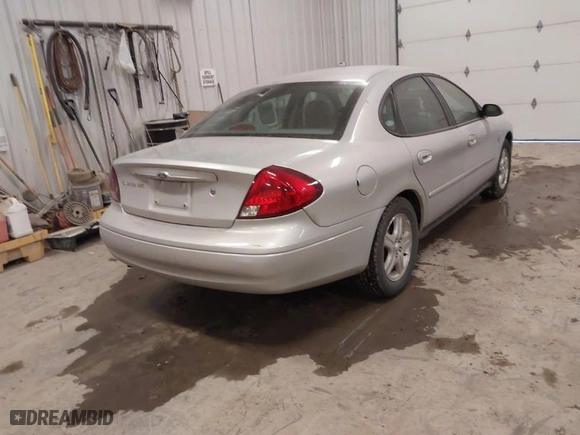 2001 Ford Taurus SEL with VIN 1FAHP56S01G106189, listed as a IAAI auction lot 41257502 with 133,902 mi miles. Bid and sale history available at carsss.com. Image 4.