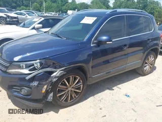 2012 Volkswagen Tiguan SE with VIN WVGAV7AX7CW534703, listed as a IAAI auction lot 42463358 with 119,699 mi miles and . Bid and sale history available at DreamBid. Image 17.